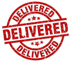 delivered round red grunge stamp