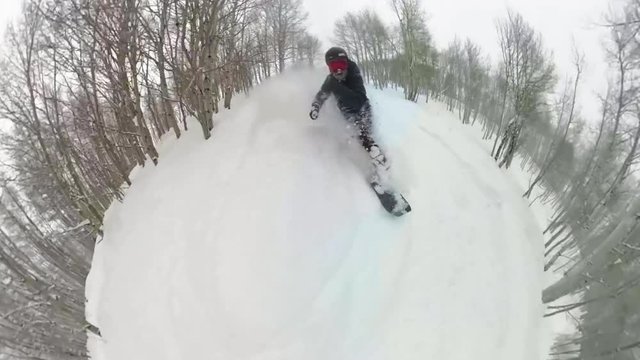 Snowboarding Through Deep Powder Face Shot Of Snow In Colorado Vail Mountains