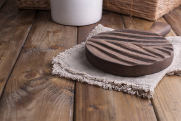 wooden board in the kitchen on the table, interior in the style of life. Free space for text.