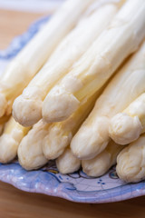 New harvest of white asparagus vegetable in spring season , washed white asparagus ready to cook, spring menu for restaurants