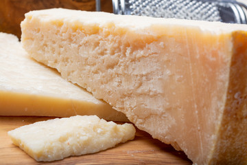 Original italian cheese, aged Parmesan cow milk cheese, pieces of Parmigiano-Reggiano