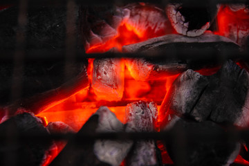 close-up shot of charcoal in a combustible stove.