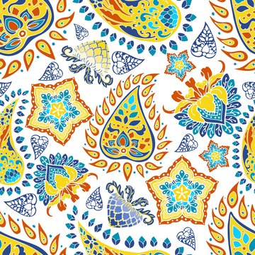 colorful blue yellow red paisley vector  seamless pattern floral background in Indian style