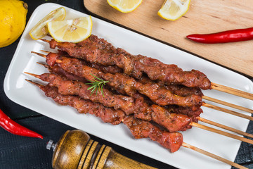 skewers shashlik kebab with red sauce