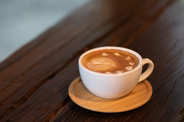 Backgrounds of Latte coffee, Coffee cup latte art in shop.