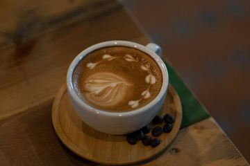 Backgrounds of Latte coffee, Coffee cup latte art in shop.