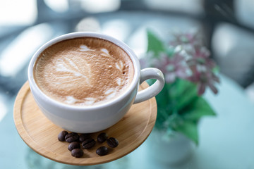 Backgrounds of Latte coffee, Coffee cup latte art in shop.