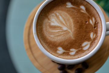 Backgrounds of Latte coffee, Coffee cup latte art in shop.