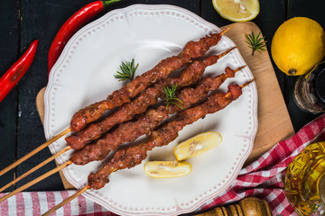 skewers shashlik kebab with red sauce