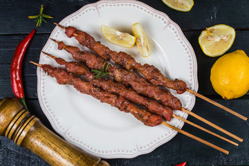skewers shashlik kebab with red sauce