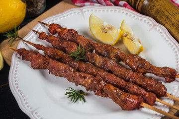 skewers shashlik kebab with red sauce