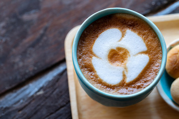 Backgrounds of Latte coffee, Coffee cup latte art in shop.