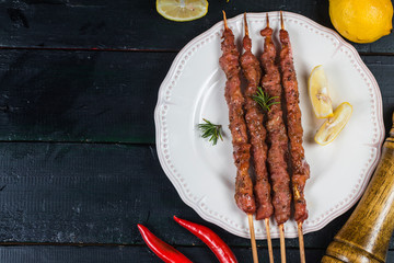 skewers shashlik kebab with red sauce