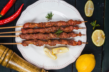 skewers shashlik kebab with red sauce