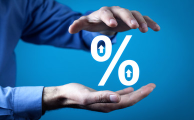 Man protect percent symbol. Business concept