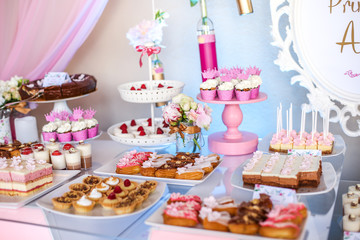 Obraz na płótnie Canvas Candy bar with delicious mini cakes, selective focus