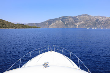 Traveling by boat near the coast of the Ithaca island, Ionian sea, Greece.