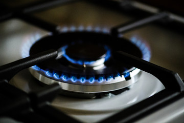Natural gas burning on kitchen gas stove