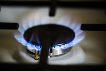 Natural gas burning on kitchen gas stove