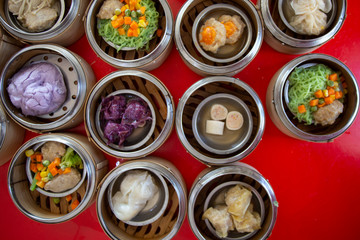 food Chinese dim sum in a bamboo steamer box sphere,Concept:Traditional Asian appetizer culture,Delicious China food festival menu top viw