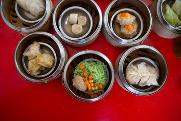 food Chinese dim sum in a bamboo steamer box sphere,Concept:Traditional Asian appetizer culture,Delicious China food festival menu top viw