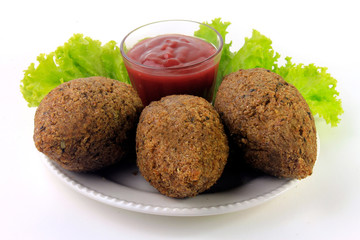 kibbeh on the plate, traditional Lebanese cuisine food, isolated on white background