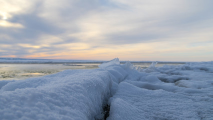 Frozen sea. Snow landscape