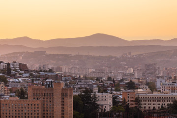 Sunset panorama view of Tbilisi, capital of Georgia country, from Narikala fortress.