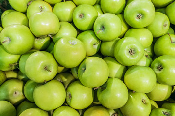 Granny smith  green apples. Raw fruit background. Top view.