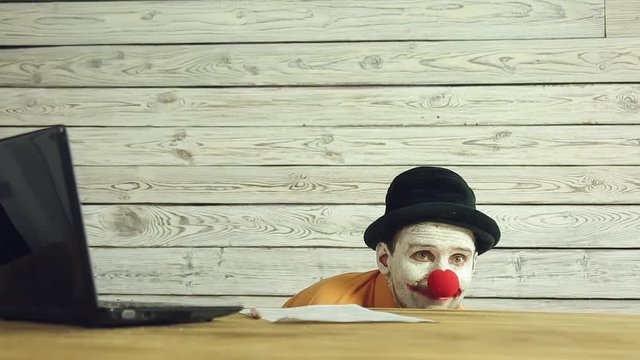 Clown businessman working in the office