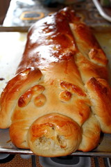 Culinary product of dough with filling, made in the form of baked pig
