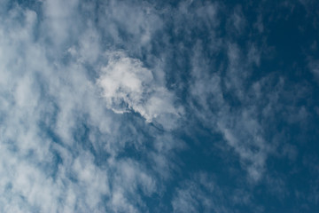 white cloud on clear blue sky