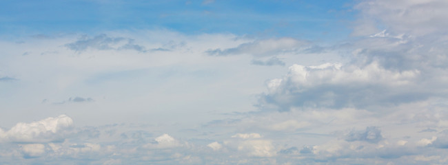 Naklejka na ściany i meble panorama image, dramatic cloud moving above blue sky, cloudy day weather background