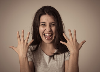 Close up portrait of surprised and happy woman celebrating winning lottery or victory