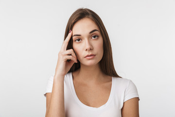 Attractive young woman standing isolated