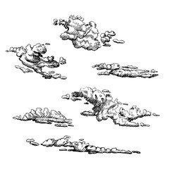 Clouds set, hand drawn in engraving style. Vector graphic illustration of cloudy sky.