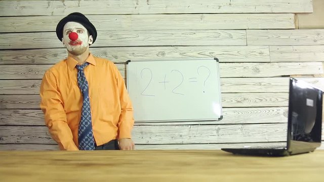 Clown businessman working in the office