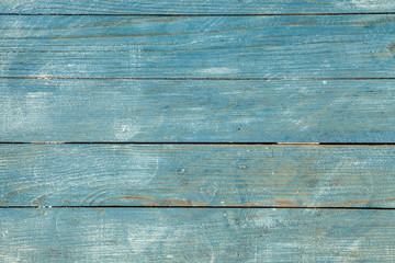 vintage blue wood background texture with knots and nail holes. Old painted wood. Blue abstract background.
