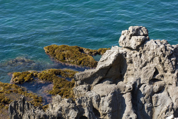 Fototapeta na wymiar rocky seashore washed by sea