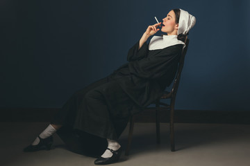Medieval young woman as a nun