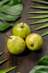 Guava on a green background.