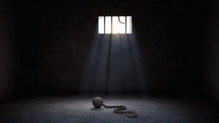 Foto op Plexiglas ball and chain for prisoner in jail with broken prison bars, prison escape or jailbreak concept © Boxyray