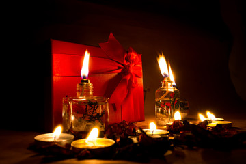 Beautiful candles and gifts burning on Valentine's Day