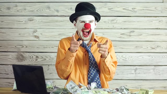 Clown businessman and money