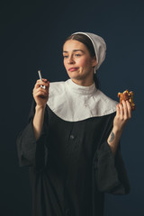 Medieval young woman as a nun