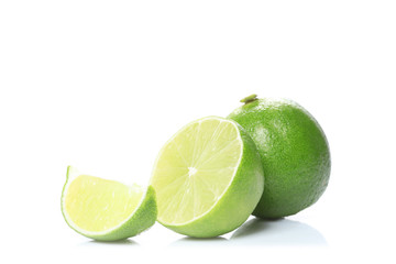 full and half lime fruit isolated on white background with copy space