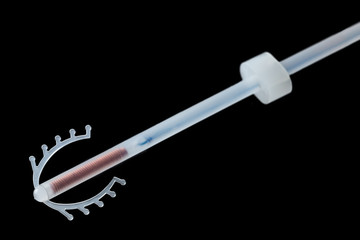 Contraceptive. Copper IUD. Birth control with copper IUD contraception. Sex education with responsabilit on black