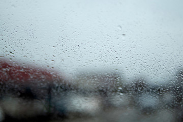 Rain drops on the glass of car.soft focus.