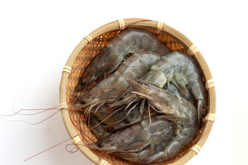 fresh shrimp in basket on white background