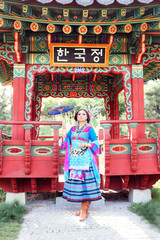 Beautiful asian woman in colorful dress